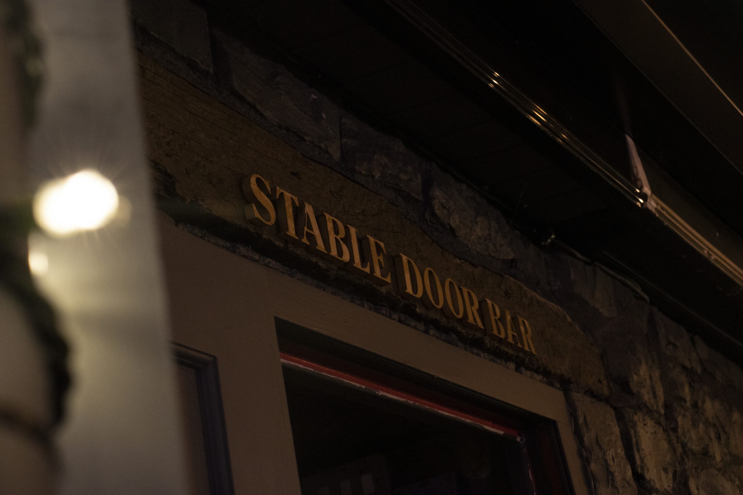 Stable bar door